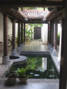 a small pond in the middle of a patio