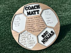 a wooden plaque with words on it that say coach matt