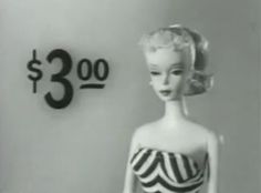 a barbie doll standing in front of a wall clock with $ 3 00 on it