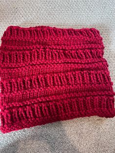 This bulky knitted cowl is the perfect addition to any outfit . It is made from 100% super bulky acrylic yarn and is machine washable. Dimensions are 28 inches around and 12 inches wide.  This makes a great gift!  **When I care enough, I make it myself** Red Hand Knitted Scarf One Size, Red Hand Knitted Scarves One Size, Cozy Hand Knitted Yarn Infinity Scarf, Cozy Hand Knitted Infinity Scarf, Red Yarn Knitting Pattern, Hand Knitted Red Yarn Knitting Pattern, Red Hand Knitted Yarn Knitting Pattern, Cozy Red Knitting Pattern, Red Spice