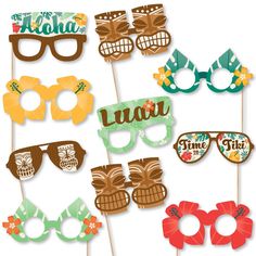 a group of party photo booth props including sunglasses and tiki masks with the words luau time to be written on them