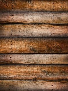 an old wooden wall with some wood planks