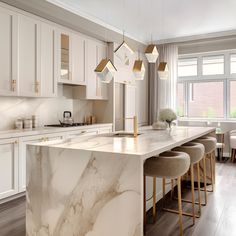 a kitchen with marble counter tops and stools