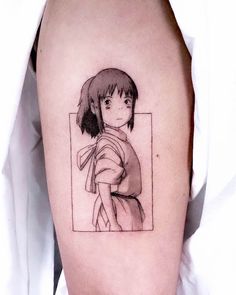 a woman's arm with a drawing of a girl on the back of it