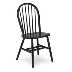 a black wooden chair on a white background with the seat up and back turned down