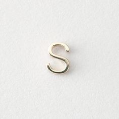 the letter s is shown on a white surface