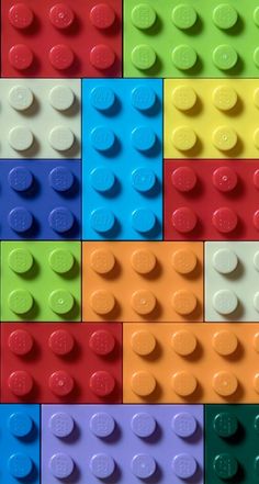 many different colored legos are arranged in rows