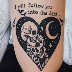 a couple of skulls in a heart with the words i will follow you into the dark