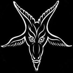 a goat head with horns and wings on a black background