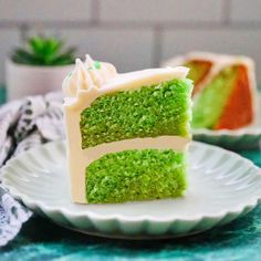 a slice of green cake sitting on top of a white plate