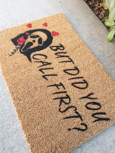 a welcome mat with the words and hearts on it