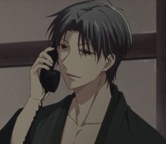 an anime character talking on a cell phone