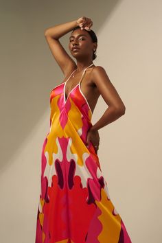 The Sharon Keyser Collection debuted on the runway at New York Fashion Week. The Collection includes this luxurious Halter Neck Backless Dress that features the artist's original New Dawn 3 design. Crafted from 100% Silk, this elegant dress moves with you and flatters the body with its romantic and sophisticated style The vibrant colors make it a show-stopper. 100% Silk Light and luxurious Flattering halter neck style Open back Stylish train Machine wash, hang dry, low heat iron, steam safe, or Halterneck Dress, House Dress, Sophisticated Style, Elegant Dress, New York Fashion Week, Halter Neck, New York Fashion, Evening Wear, The Collection