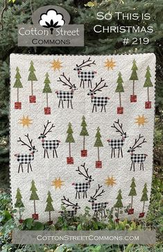 a quilted christmas tree pattern on the cover of a book, so this is christmas