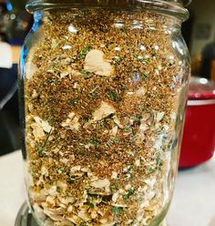 a jar filled with lots of different kinds of food