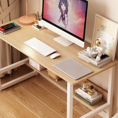 a desktop computer sitting on top of a wooden desk next to a keyboard and mouse