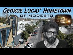 a man standing in front of a building with the words george lucas'home town of modesto