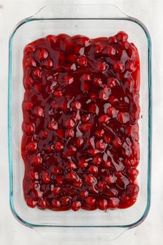 cranberry sauce in a square glass dish