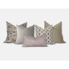 six pillows in different colors and patterns