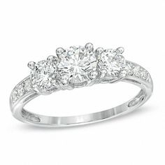 three stone diamond ring in 18k white gold with 0 00ct round brilliant cut diamonds