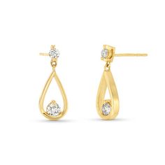 These Pear Drop Diamond Earrings feature 4 diamonds totaling approximately 0.70 carats set in 14K yellow gold. Drop Diamond Earrings, Diamonds Direct, Fine Jewelry Designers, Diamond Drop Earrings, Mens Jewelry Bracelet, Diamond Pendant Necklace, Engagement Ring Wedding Band, Diamond Bracelets, Pendant Bracelet