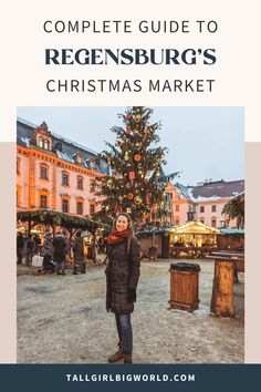 a woman standing in front of a christmas tree with the words, complete guide to regensburg's christmas market