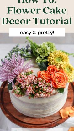 a white cake with flowers on top and the words how to flower cake decor easy & pretty