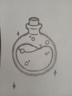 a drawing of a bottle with bubbles and stars on the bottom is shown in black ink