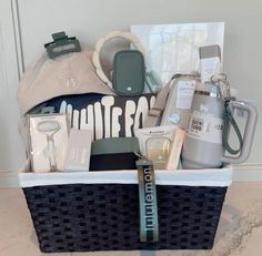 a basket filled with personal care items sitting on top of a counter