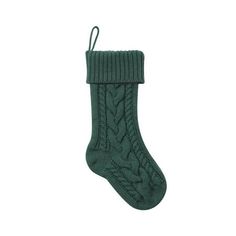 a green knitted stocking hanging from the side on a white background with clippings