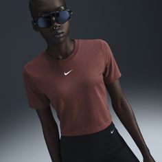 Made with our soft jersey fabric, this everyday tee gives you a premium look and feel. Its slim fit and cropped length make it comfortable enough to wear around the house yet elevated enough to wear out in the city. Nike Crop Top, Nike Brown, Brown Fits, Swoosh Logo, Women Lifestyle, Cropped T Shirt, Crop Tshirt, Nike Tops, Nike Sportswear