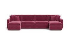 a red sectional couch with pillows on the top and bottom, sitting in front of a white background