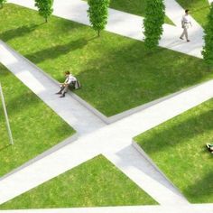 two people are sitting on the grass in front of some trees and one person is walking