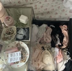 coquette luggage mess lace pink pattern white cream table  chanel Pearl necklaces bedside floral pink Feb 8, Dream Bedroom, Just Girly Things, Bedroom Inspo, My New Room, New Room, Dream Room, Pink Aesthetic