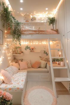 a loft bed with stairs and lights in the ceiling is next to a white couch