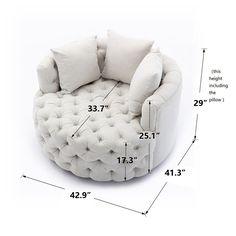 this is an image of a round chair with pillows on the back and measurements for it