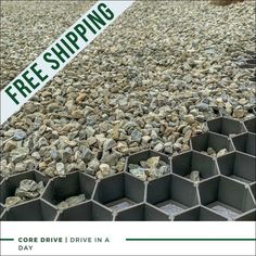 there is a sign that says free shipping on the side of a pile of rocks