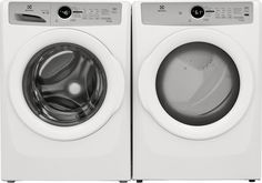 the front load washer and dryer are side by side, both in white