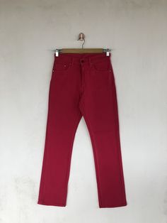 Vintage Levis Jeans Pink Levis 554 Denim Pants - BS40267.  Manual Measurement (laying in flat area):  1) Waist: 28 inch.  2) Rise: 10.8 inch.  3) Hips: 19 inch.  4) Tight: 9.5 inch.  5) Outseam: 40.5 inch.  6) Inseam: 29.5 inch.  7) Leg opening: 7.5 inch.  Made In: JAPAN.  Fabric Material: 100% Denim Cotton.  Condition: In good vintage condition overall.  Please check all the measurement to ensure a proper fit.  Remember to allow yourself some extra room for movement.  You can compare these info Slim Fit Bottoms With Five Pockets, High Waist Straight Fit Cotton Bottoms, Slim Fit High Rise Cotton Pants, High Rise Slim Fit Cotton Pants, 90s Fitted Straight Leg Jeans, Trendy Fitted Pants With Standard Cut Leg, Retro Stretch Cotton Jeans, Fitted Cotton Jeans, Fitted Full Length Cotton Jeans