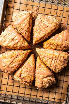 an overhead view of some cookies on a cooling rack