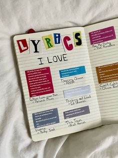 an open notebook with writing on it that says, i love uyrrcs