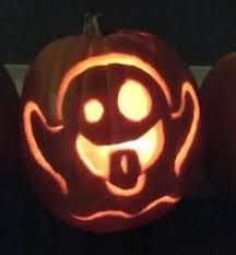 a pumpkin carved to look like a smiley face