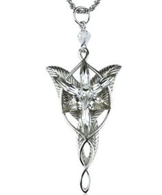 a silver necklace with an animal head hanging from it's center, on a chain