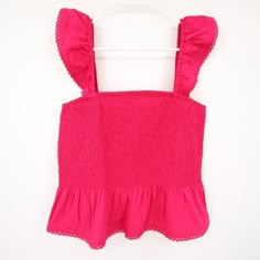 Nwt Roller Rabbit Pink Smocked Tank Top Peplum Ruffle Short Sleeve Size S, M, L Barbie Core Condition: New With Tags Sizes Available: S, M, L We Are Happy To Answer Your Questions! Add A Touch Of Sweetness To Your Wardrobe With This Nwt Roller Rabbit Pink Smocked Peplum Ruffle Short Sleeve Top. The Pink Color Gives A Soft And Feminine Look, While The Smocked Detailing And Peplum Ruffle Add A Trendy And Flattering Silhouette. This Top Is Brand New With Tags, Ensuring A Pristine Condition. Sizes A Roberta Roller Rabbit, Barbie Core, Roller Rabbit, Birthday Wishlist, Ruffle Shorts