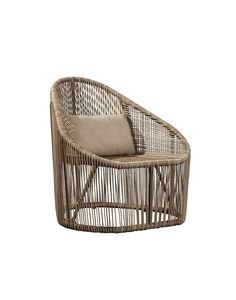 a wicker chair with a cushion on it