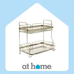 two tiered metal hospital bed with the words at home above it