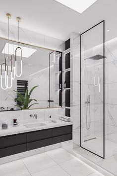 a modern bathroom with black and white fixtures