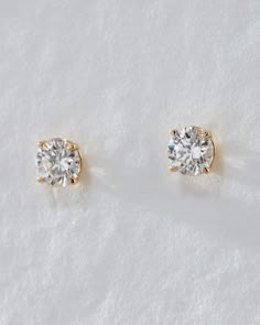 The Ultimate Solitaire Studs | Luv Aj Diamond Studs Aesthetic, Gold And Diamond Earrings Studs, Diamond Stud Earrings Aesthetic, Diamond Stud Aesthetic, Classic Earrings Classy, Diamond Earrings Studs Gold, Classic Solitaire Diamond Earrings, Timeless Round Diamond Cut Earrings, Solitaire Earrings Studs