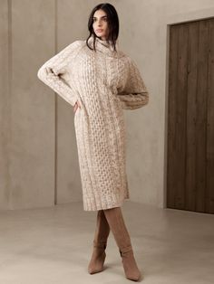 Weaving a cozy story for one generation to the next, our designers crafted this beautiful honeycomb cable sweater dress to last using a luxurious blend of warm wool and lavish yak.  Wear it season after season, and share it with those you love the mo Sweater Dress Outfit Work, Beige Sweater Dress Outfit, Sweater Dress With Boots, Sweater Dress Outfit Winter, Winter Sweater Dress, Fuzzy Sweater Dress, 2024 Clothes, Maxi Sweater Dress, Cable Sweater Dress