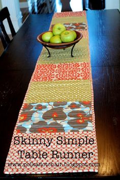 a table runner with apples in a bowl sitting on top of it, along with the words skinnyy simple table runner